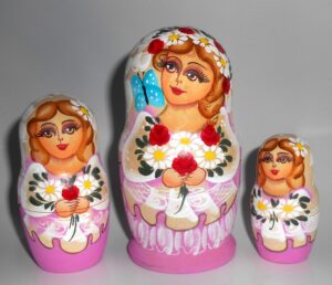 Bride in purple with roses and butterfly nesting Doll Babooshki s