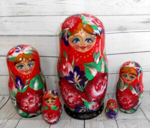 Alice in red dress with wild flowers Babushka Matryoshka nesting Doll Babooshki Babushkas