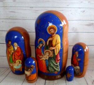 Nativity over blue sky nesting Doll Babooshki s