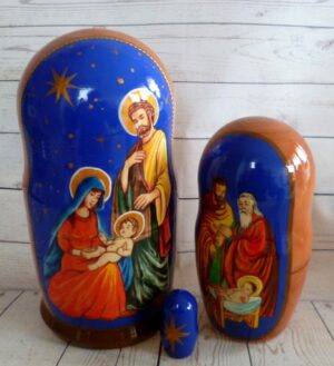 Nativity over blue sky nesting Doll Babooshki s