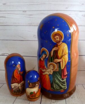 Nativity over blue sky nesting Doll Babooshki s