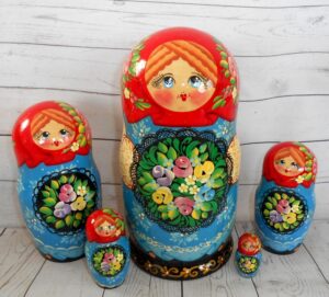 Olga with floral tray red scarf Babushka Matryoshka nesting Doll Babooshki Babushkas