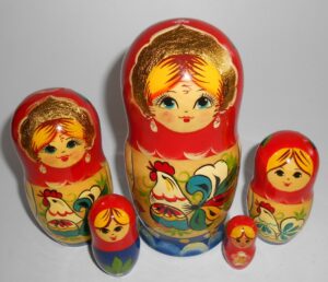Girl with Rooster nesting Doll Babooshki s