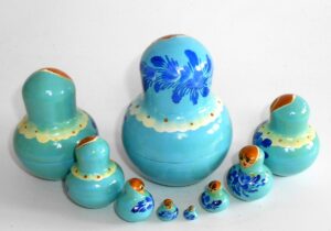 Girl in light blue dress 9-set nesting Doll Babooshki s