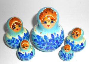 Girl in light blue dress 9-set nesting Doll Babooshki s
