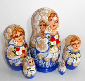 Bride in blue and white with mirrow nesting Doll Babooshki s