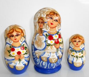 Bride in blue and white with mirrow nesting Doll Babooshki s