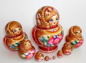 Olga in gold scarf 10-set nesting Doll Babooshki s