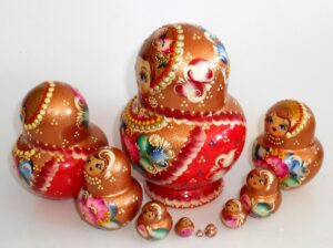 Olga in gold scarf 10-set nesting Doll Babooshki s