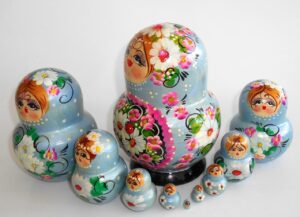 Girl in pale blue dress 10-set nesting Doll Babooshki s