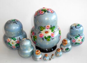 Girl in pale blue dress 10-set nesting Doll Babooshki s