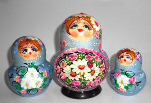 Girl in pale blue dress 10-set nesting Doll Babooshki s