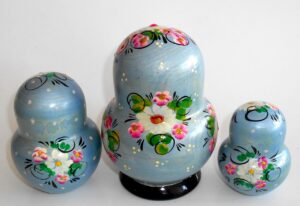Girl in pale blue dress 10-set nesting Doll Babooshki s