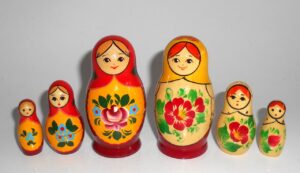 Collection of TWO Kirovie 3-set Babushkas Babushka Matryoshka nesting Doll Babooshki Babushkas Classic Village Traditional
