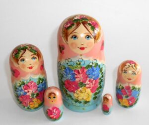 Klara small in pink scarf light blue dress Babushka Matryoshka nesting Doll Babooshki Babushkas