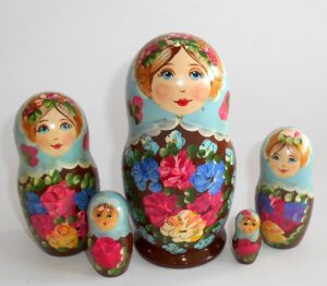 Klara small in light blue scarf brown dress Babushka Matryoshka nesting Doll Babooshki Babushkas