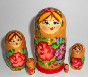 Girl in gold floral dress 5-set Babushka Matryoshka nesting Doll Babooshki Babushkas
