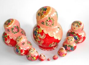 Klara in pink scarf red dress 10-set nesting Doll Babooshki s