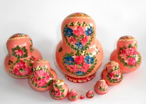 Klara in pink scarf red dress 10-set nesting Doll Babooshki s
