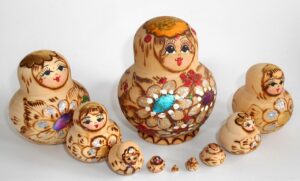 Girl with flowers 10-set nesting Doll Babooshki s