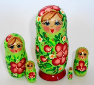 Girl in green dress Babushka Matryoshka nesting Doll Babooshki Babushkas