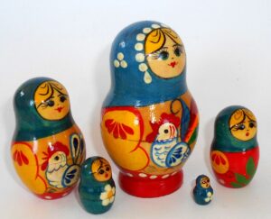 Girl with chicken blue scarf nesting Doll Babooshki s