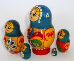 Girl with chicken blue scarf nesting Doll Babooshki s