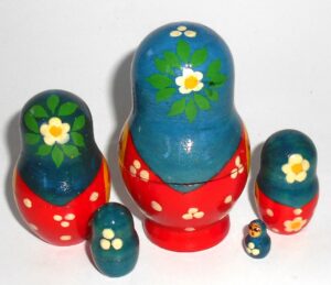 Girl with chicken blue scarf nesting Doll Babooshki s