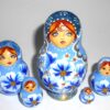 Girl in light blue dress with beads Babushka Matryoshka nesting Doll Babooshki Babushkas