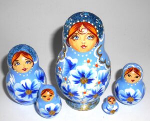 Girl in light blue dress with beads Babushka Matryoshka nesting Doll Babooshki Babushkas