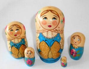 Marusya with golden butterfly light blue dress nesting Doll Babooshki s