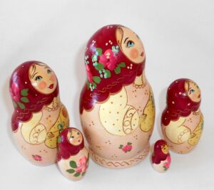 Marusya with baby dark red scarf medium nesting Doll Babooshki s