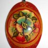 Pendant oval: flowers on red Babooshki s