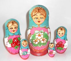 Village girl w/fowers blue scarf pink apron Babushka Matryoshka nesting Doll Babooshki Babushkas