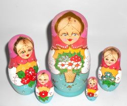 Village girl w/fowers pink scarf yellow apron Babushka Matryoshka nesting Doll Babooshki Babushkas