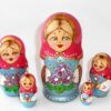 Village girl with purple flowers pink scarf Babushka Matryoshka nesting Doll Babooshki Babushkas