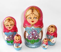 Village girl with purple flowers pink scarf Babushka Matryoshka nesting Doll Babooshki Babushkas