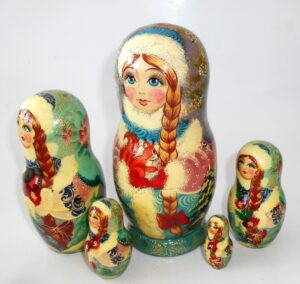 Girl in Winter outfit with squirrel nesting Doll Babooshki s