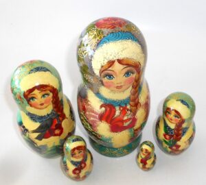 Girl in Winter outfit with squirrel nesting Doll Babooshki s