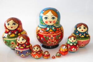 Village girl blue scarf orange dress 10-set Babushka Matryoshka nesting Doll Babooshki Babushkas Classic Village Traditional