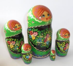 Clara in floral apron green scarf large 5-set nesting Doll Babooshki s Classic Village Traditional