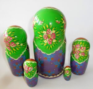 Clara in floral apron green scarf large 5-set nesting Doll Babooshki s Classic Village Traditional