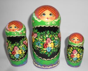 Clara in floral apron green scarf large 5-set nesting Doll Babooshki s Classic Village Traditional