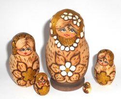 Girl with white flowers brown dress Babushka Matryoshka nesting Doll Babooshki Babushkas