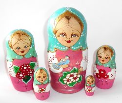 Village girl with bird and flower bunch blue scarf Babushka Matryoshka nesting Doll Babooshki Babushkas