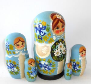 Girl with floral tray 5-set nesting Doll Babooshki s Classic Village Traditional