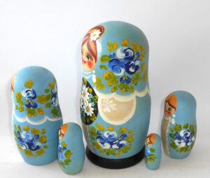 Girl with floral tray 5-set nesting Doll Babooshki s Classic Village Traditional