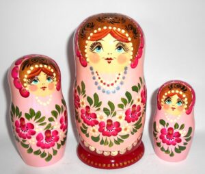 Girl in traditional pink dress with hot pink flowers large 5-set nesting Doll Babooshki s Classic Village Traditional